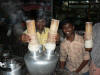 Bilde av "put kana" som er en spesialitet i soer India, ris og kokosnoett fylles i spesielle tre-roer og steames. 